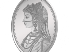 a silver coin with a woman's face on it