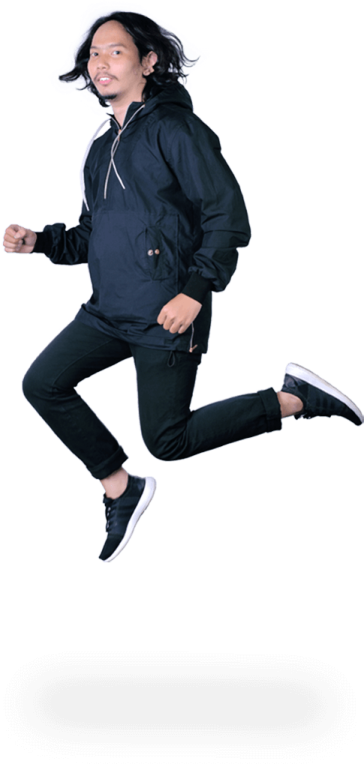 a young boy is jumping in the air