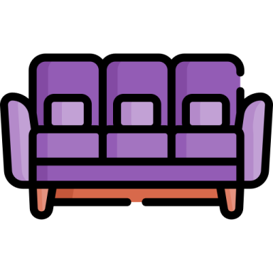 a purple couch with three pillows