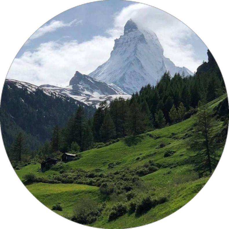 a mountain with a snow covered peak in the background