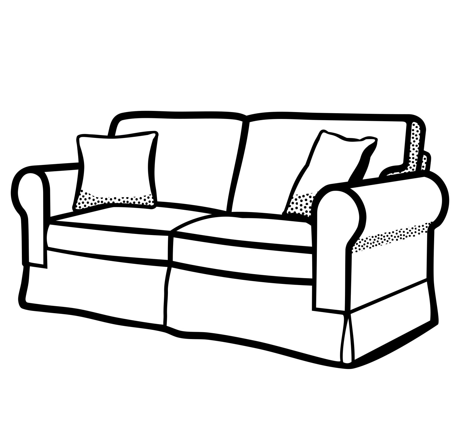 a black and white couch with pillows
