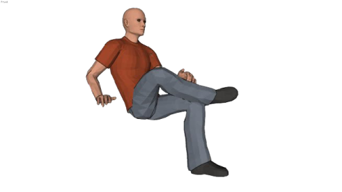 a man sitting on the ground with his legs crossed