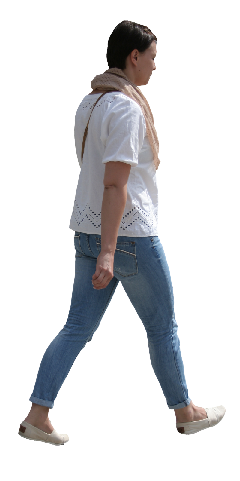 a woman walking with her back to the camera