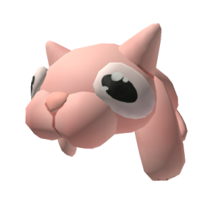 the head of a pink dog with black eyes