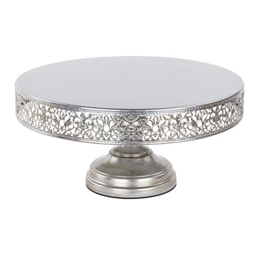 a silver cake stand on a white background