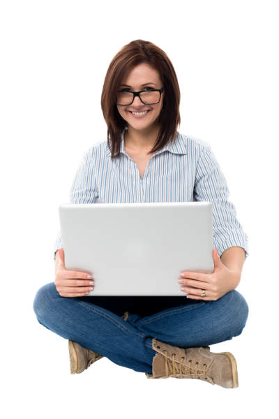 a woman sitting on the floor with her laptop