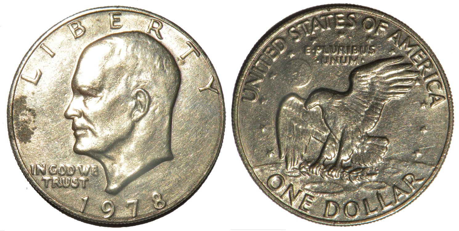 a silver coin with an image of a man on it