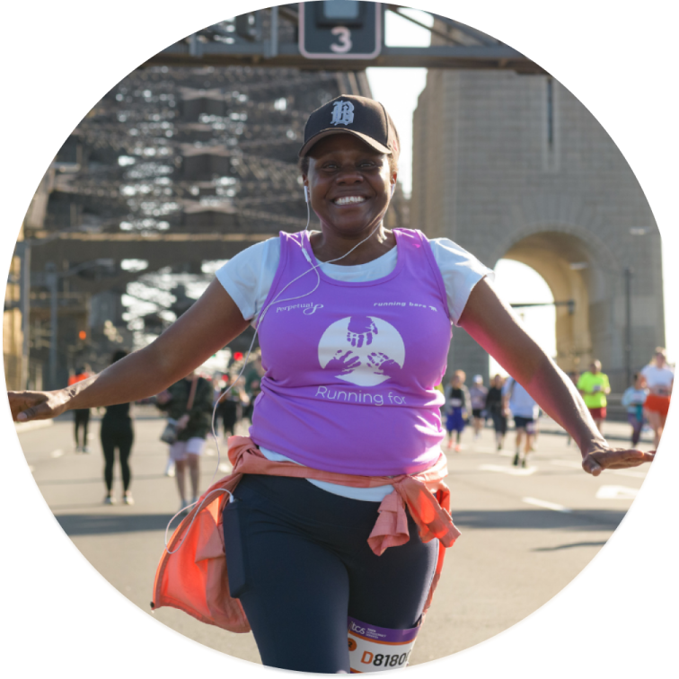 a woman in a purple shirt is running