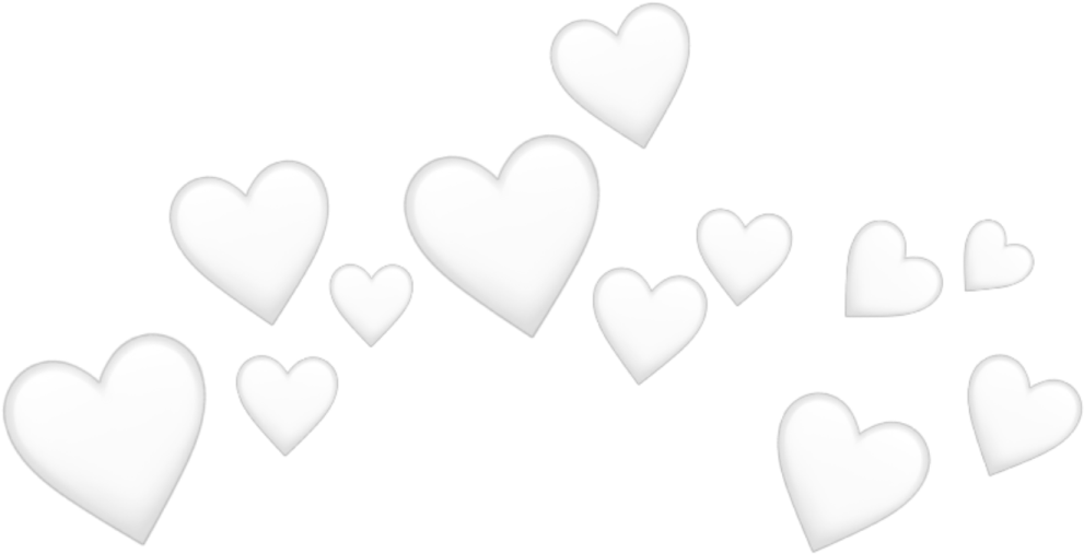 a group of white hearts floating in the air