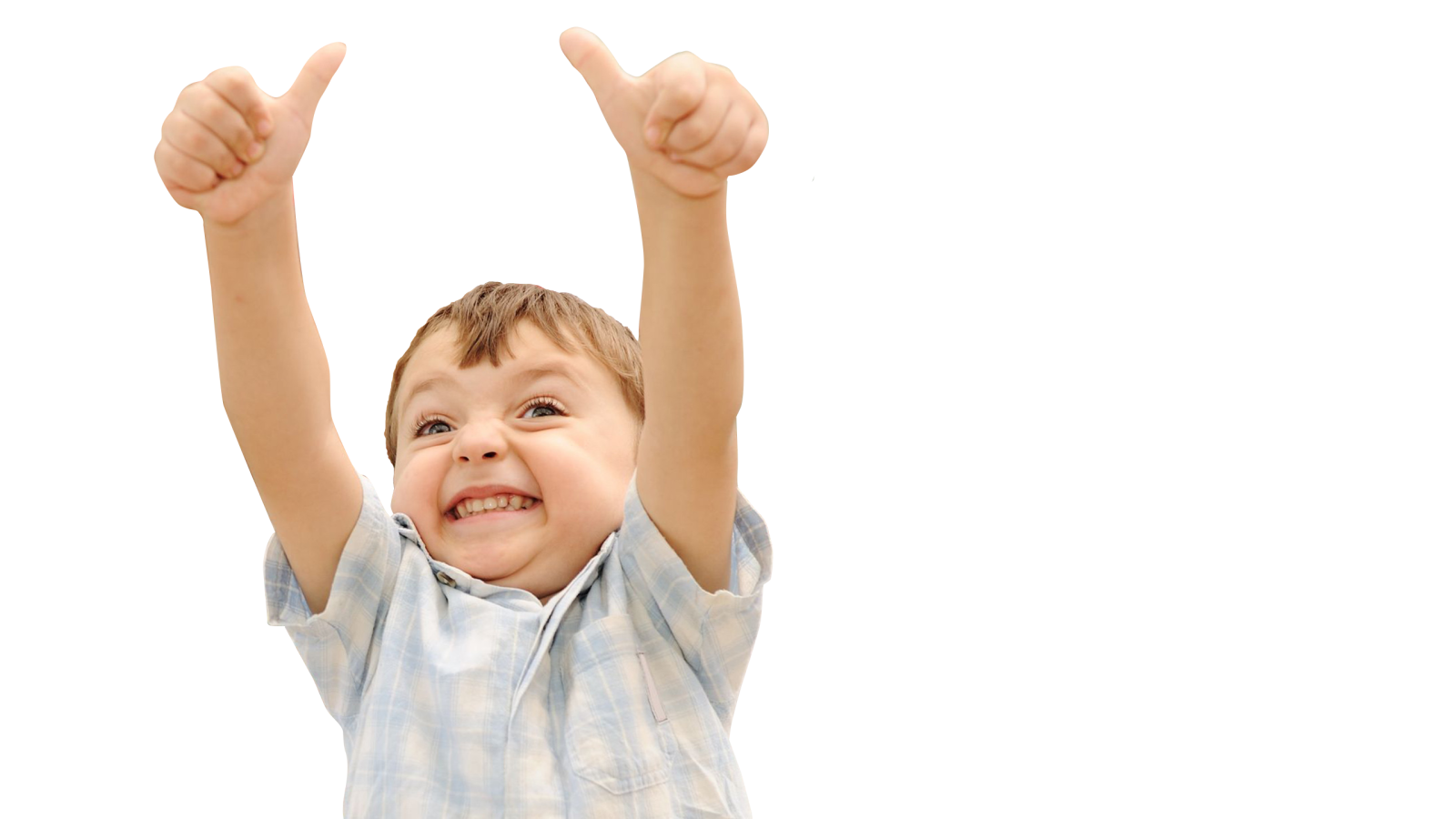 a young boy raising his hands in the air