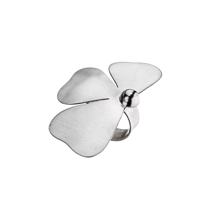 a silver flower on a white background