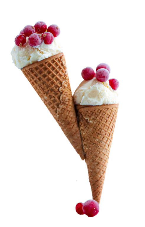 two cones of ice cream with rass on top