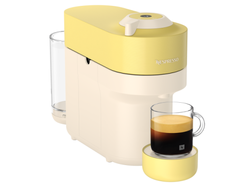 a coffee maker with a cup of coffee