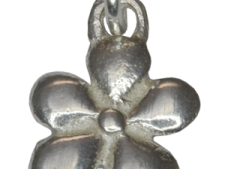 a silver flower charm
