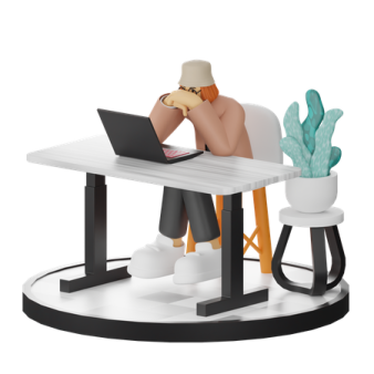 a person sitting at a desk with a laptop