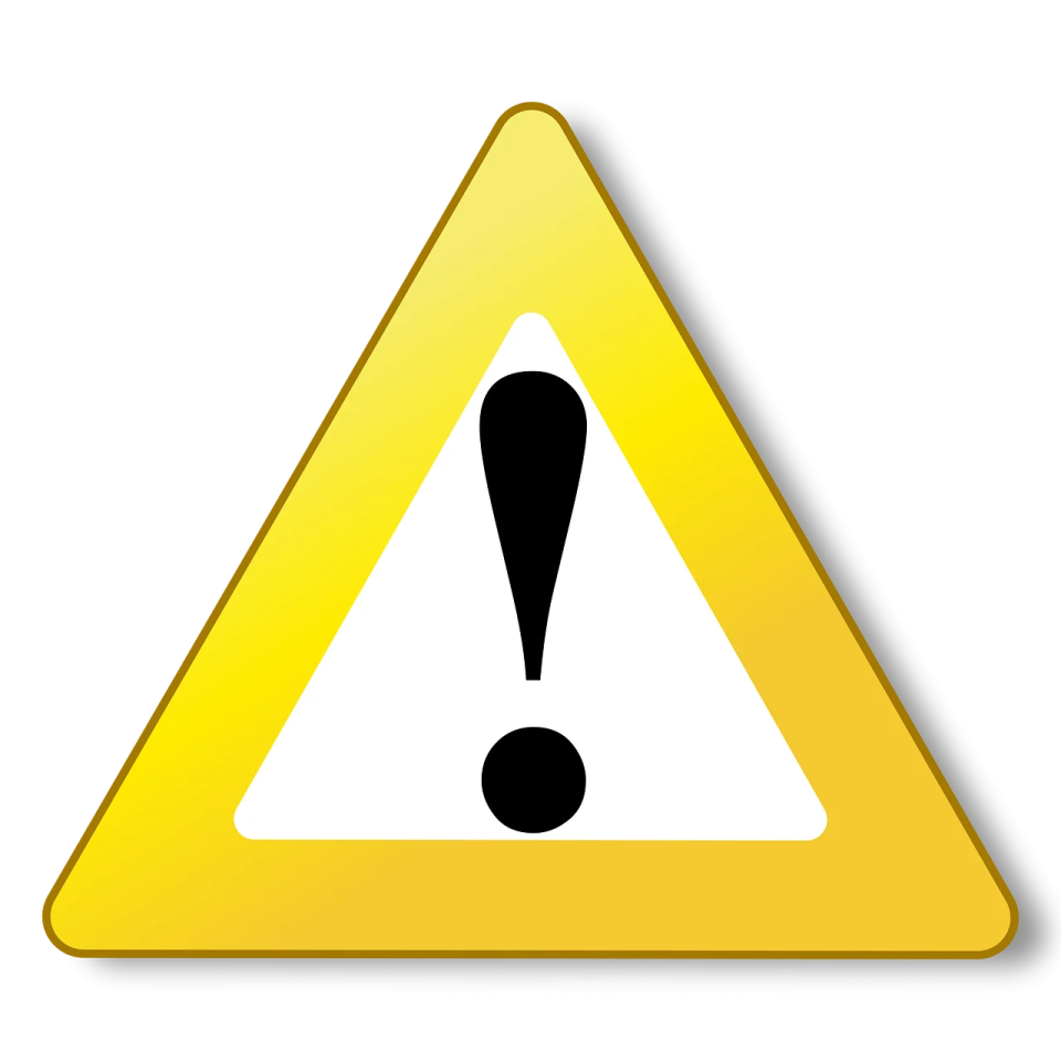 a yellow triangle with a question mark on it
