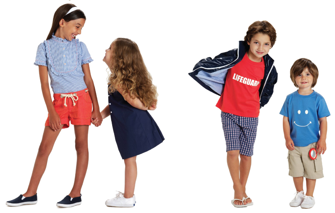 a group of young children standing next to each other kids