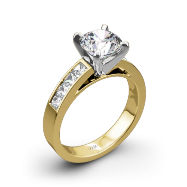 a yellow gold engagement ring with a single diamond