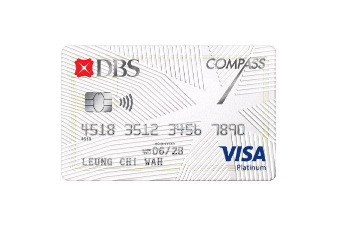 a white credit card with a red arrow on it