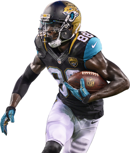 a football player is running with the ball