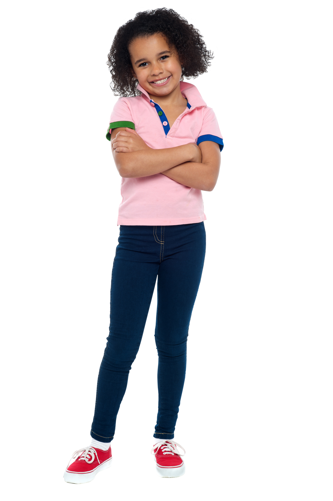 a little girl standing with her arms crossed