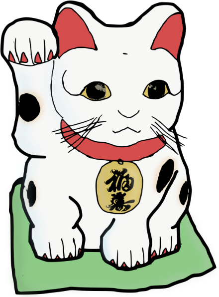 a white cat sitting on top of a green pillow