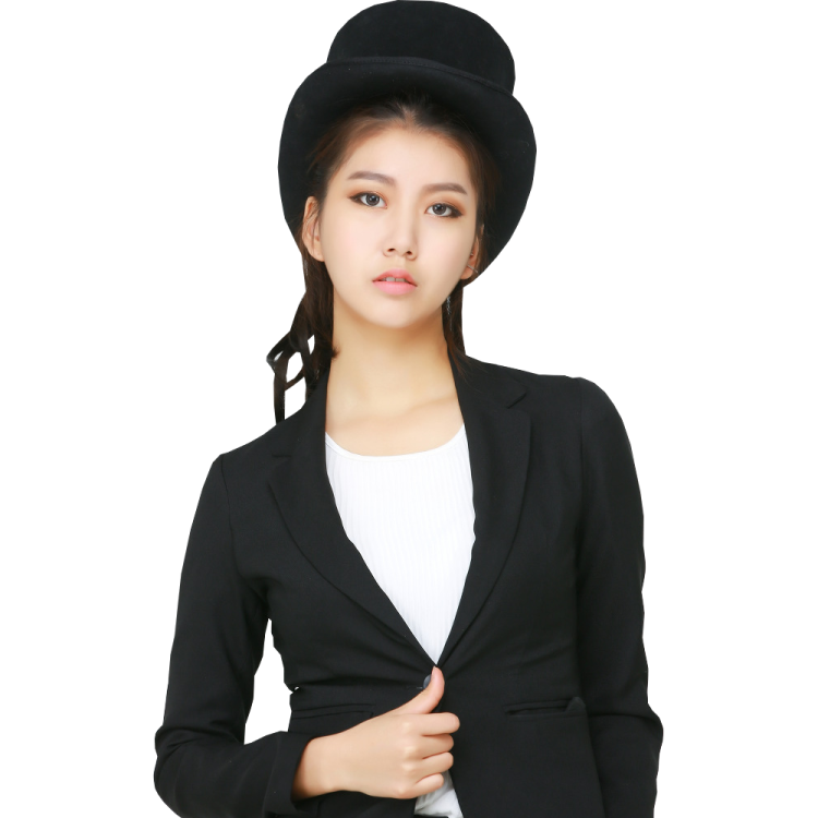 a woman wearing a black suit and hat