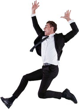 a man in a suit and tie is jumping