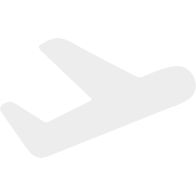 a white airplane flying in the sky