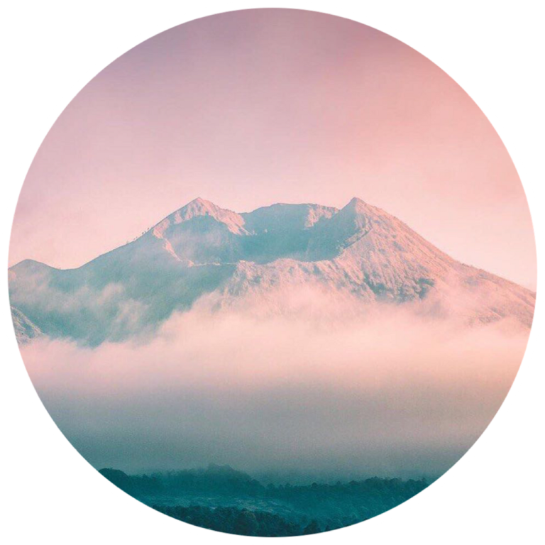 an image of a mountain covered in fog