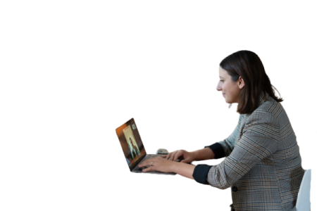 a woman sitting on a chair using a laptop