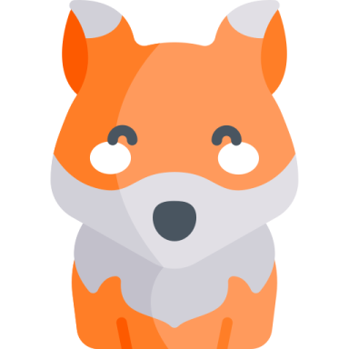an orange and white fox with a black nose