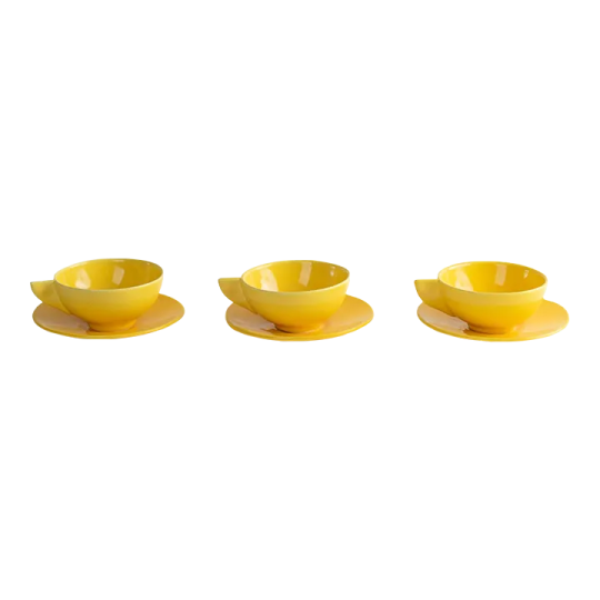 a set of three yellow dishes