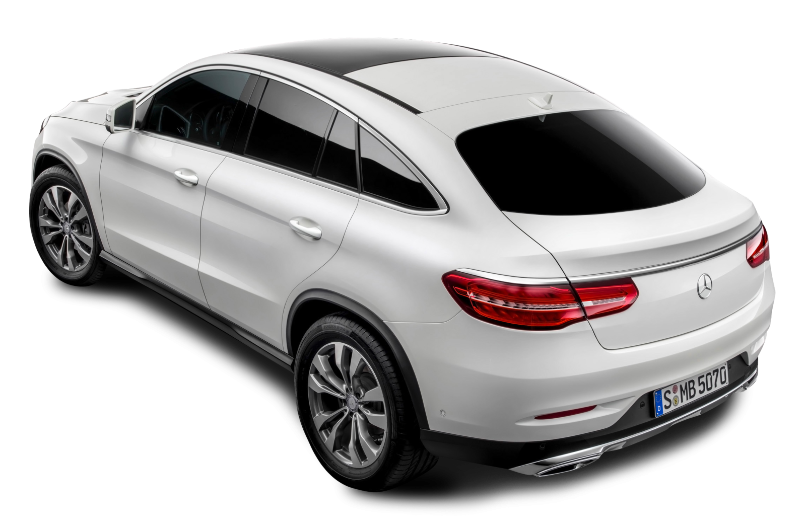 the rear view of a white mercedes suv