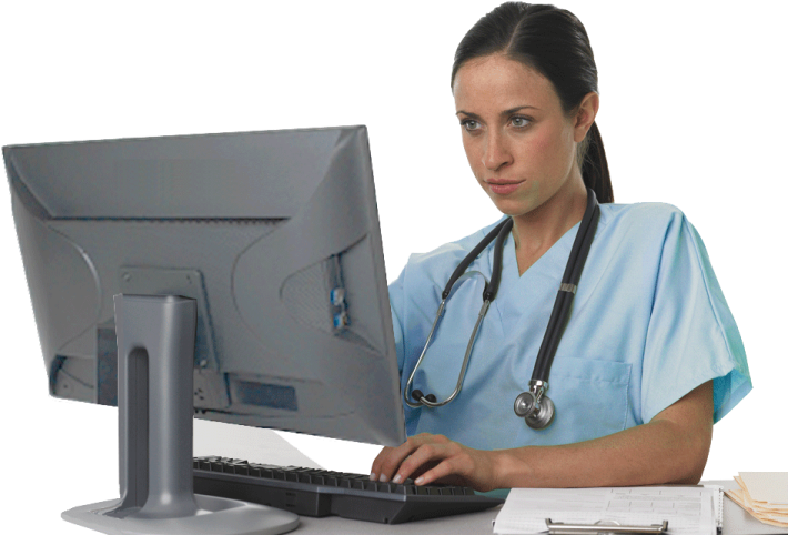 a woman sitting at a desk with a computer