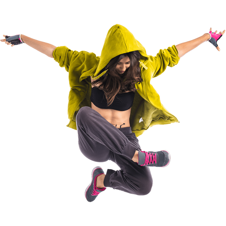 a woman jumping in the air while wearing a hoodie