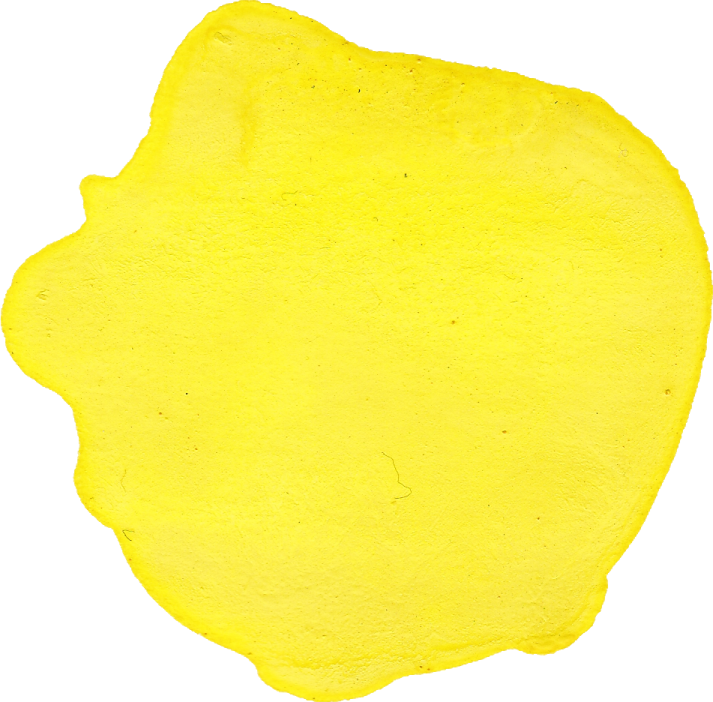 a piece of yellow clay on a white background