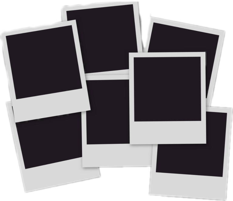 a pile of black and white polaroids