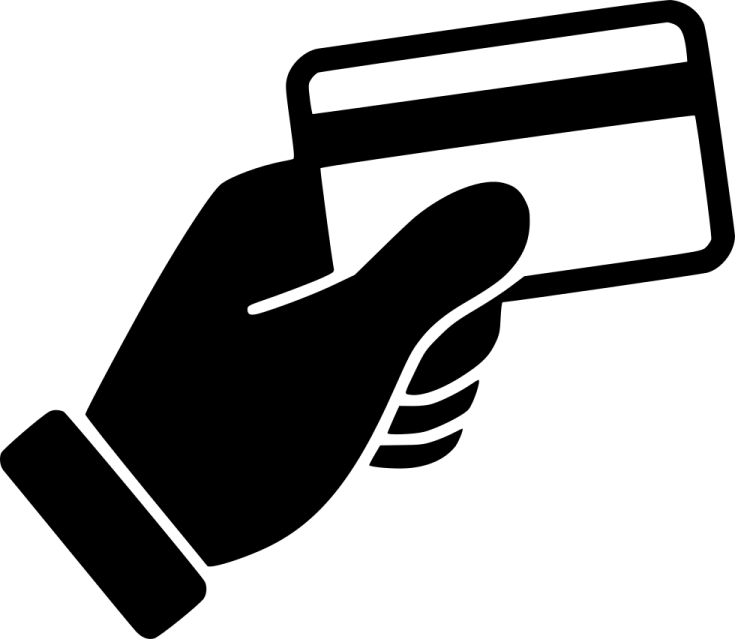 a hand holding a credit card