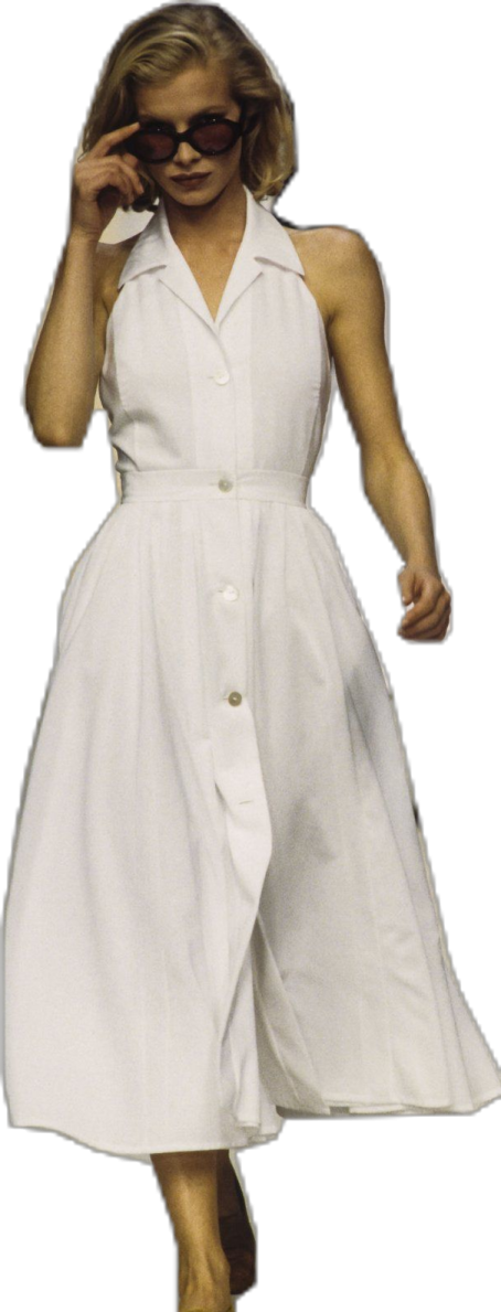 a woman wearing a white dress and sunglasses