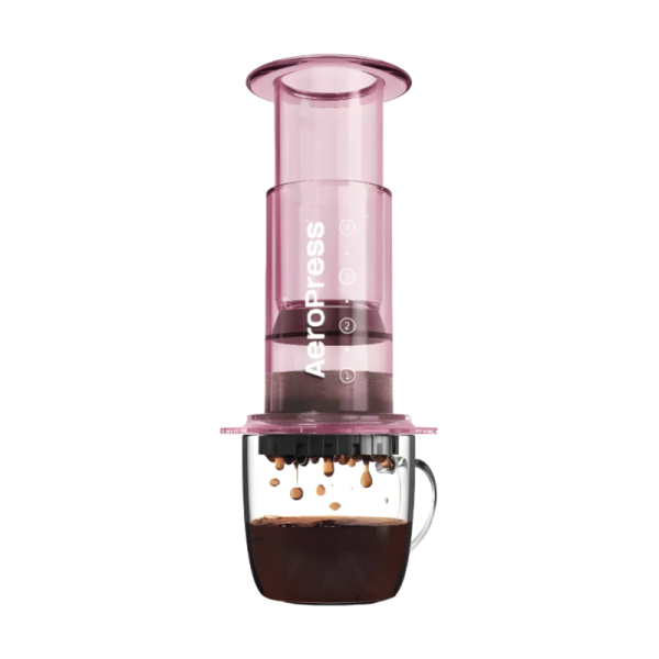 a glass coffee maker with the lid open