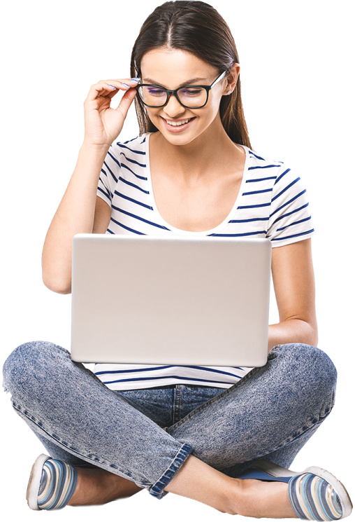 a woman sitting on the floor with her laptop