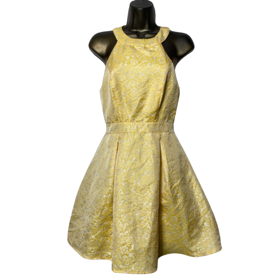 a yellow dress on a manne