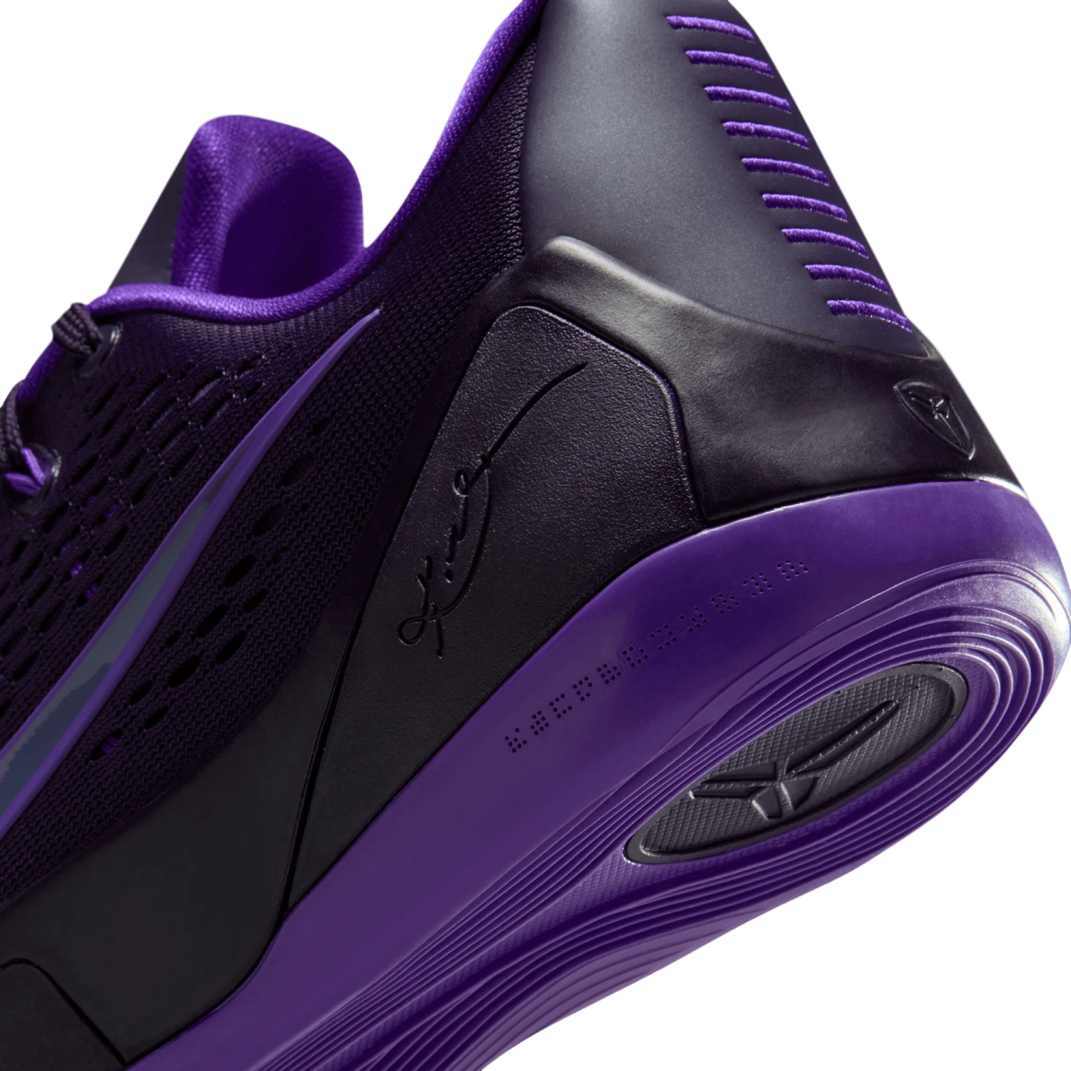 a close up view of the nike zoom zoom basketball shoe in purple and black