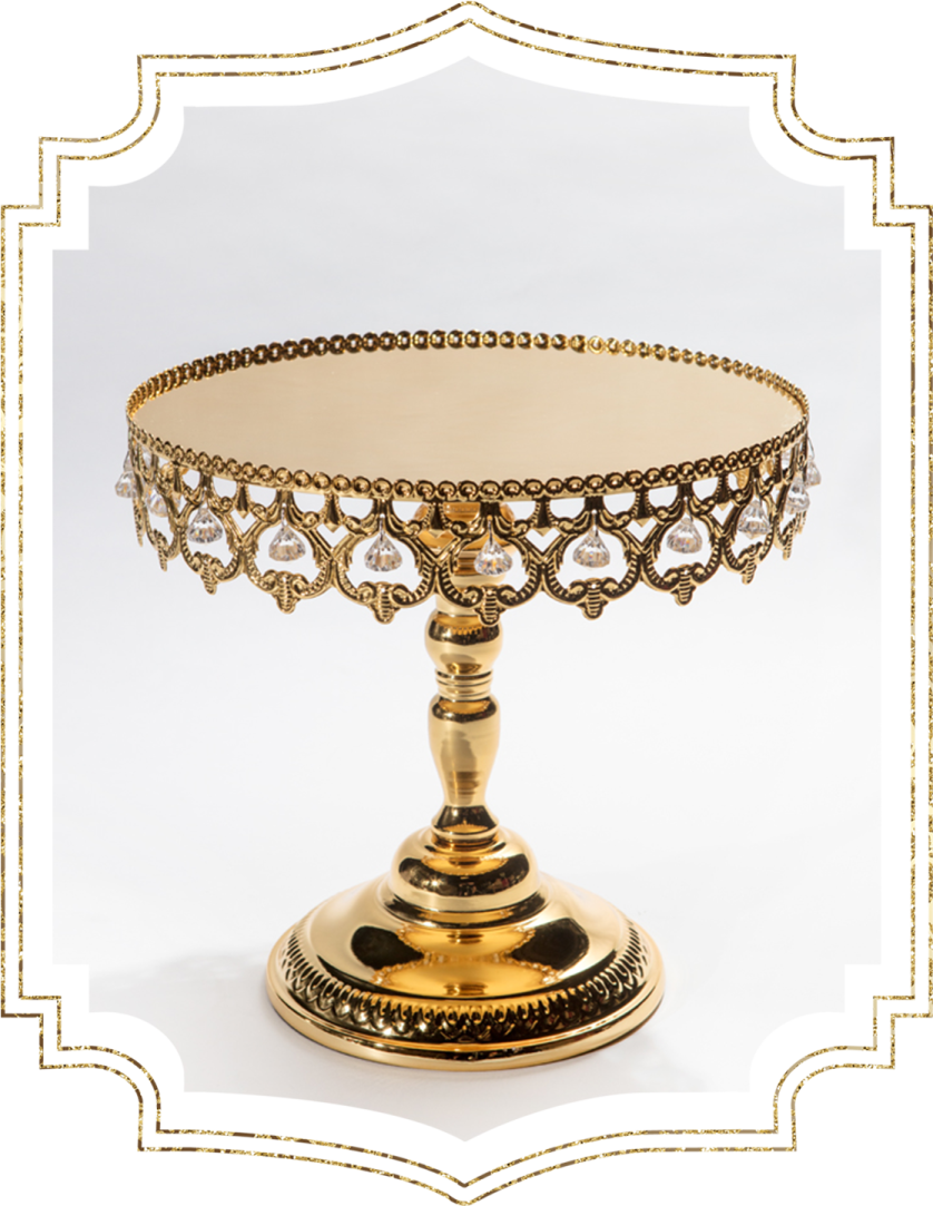 a gold - plated cake stand on a white background