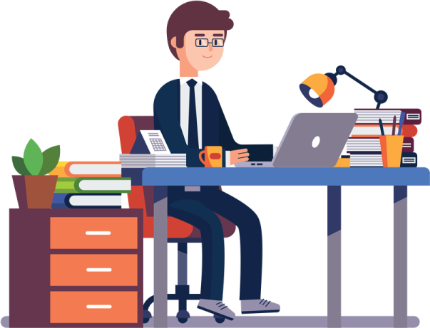 a man sitting at his desk and working on a laptop