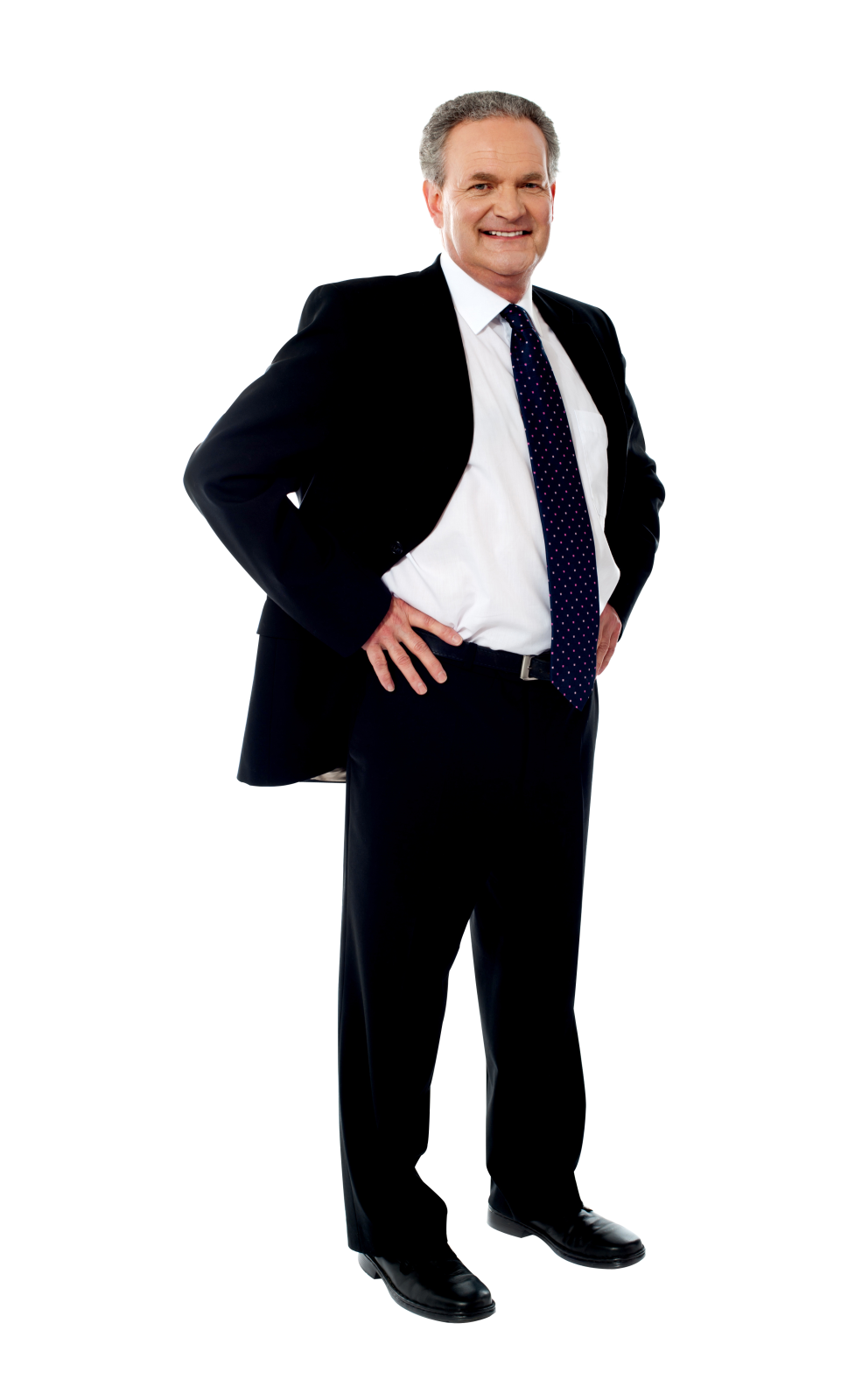 a man in a suit and tie standing