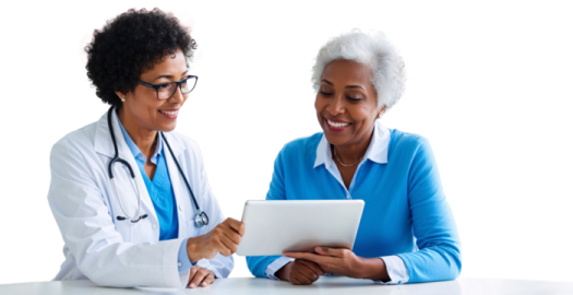 two female doctors looking at a tablet