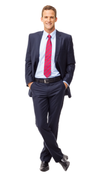 a man in a blue suit and red tie