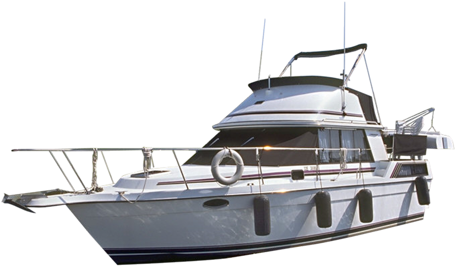 a white boat sitting on top of a dock